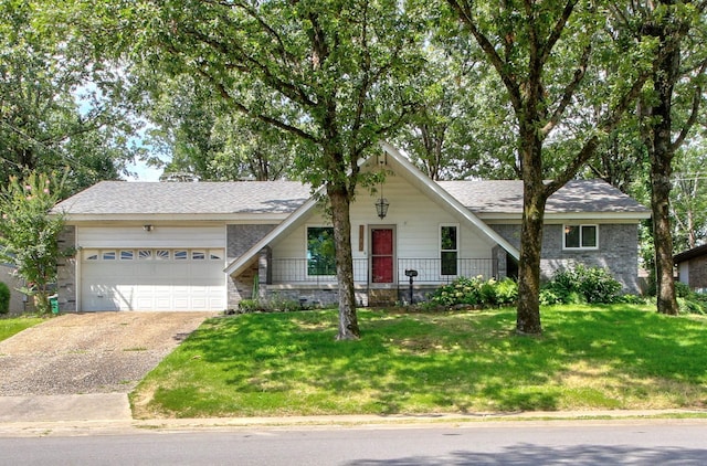 ranch-style house with a garage and a front lawn