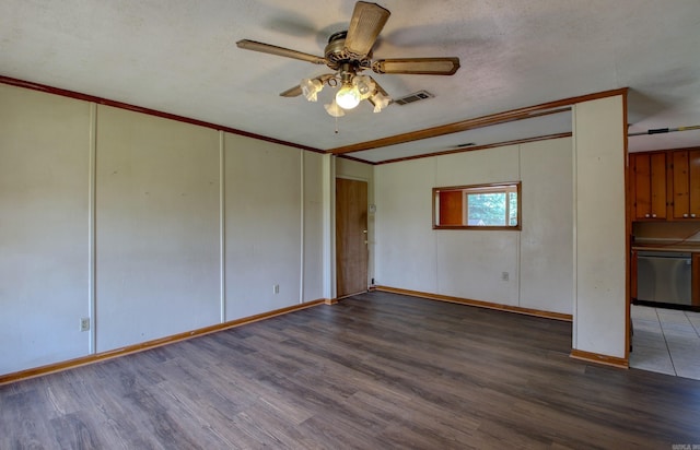 unfurnished room with hardwood / wood-style flooring, ornamental molding, ceiling fan, and a textured ceiling