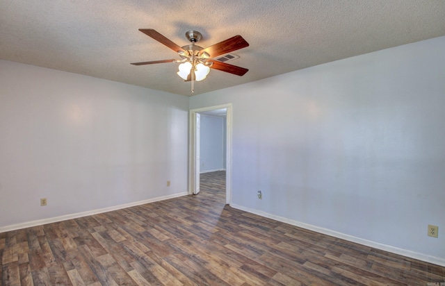 spare room with ceiling fan, dark hardwood / wood-style floors, and a textured ceiling