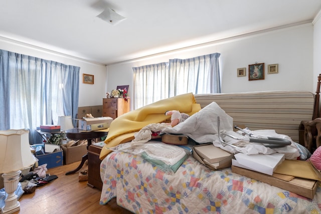 bedroom with hardwood / wood-style flooring