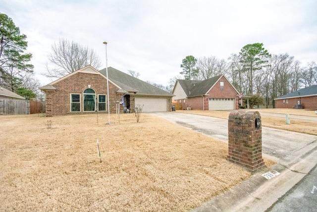 single story home with a garage