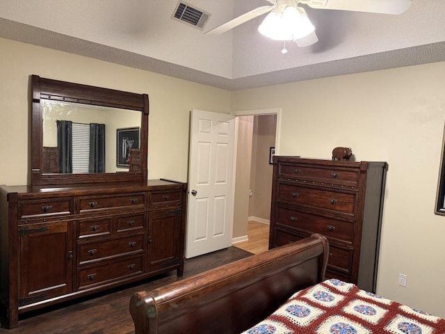 bedroom featuring dark hardwood / wood-style floors and ceiling fan