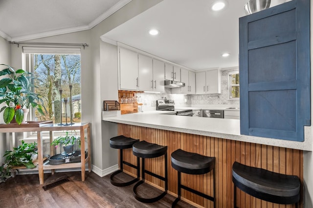 kitchen featuring backsplash, stainless steel electric range, ornamental molding, and white cabinets