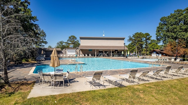 view of pool featuring a patio