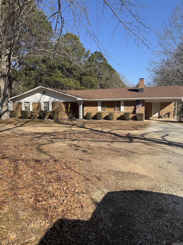 view of front of home featuring a carport