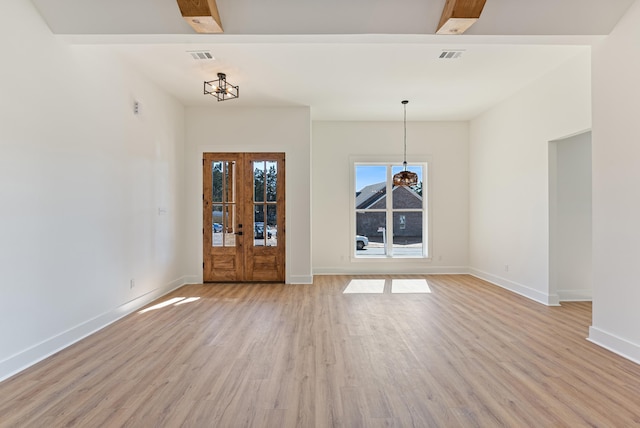 interior space with french doors, light hardwood / wood-style floors, and beamed ceiling