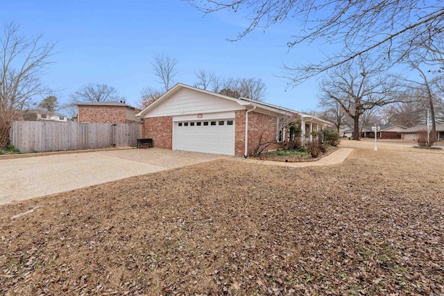 view of property exterior featuring a garage