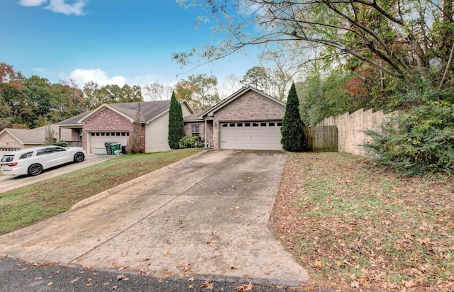 ranch-style home featuring a garage