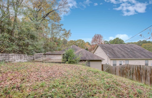 view of yard featuring a deck