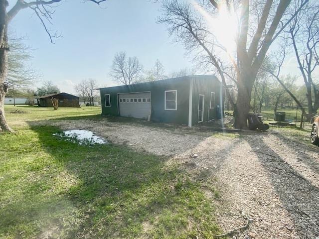 205 S Main, Okolona, AR 71962 - exterior space with a front lawn