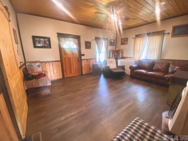 205 S Main, Okolona, AR 71962 - living room with dark hardwood / wood-style flooring, wood ceiling, and a wealth of natural light
