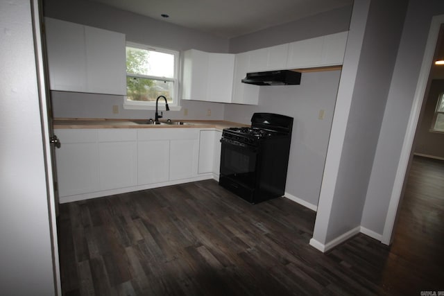 kitchen featuring sink, black range with gas cooktop, extractor fan, white cabinets, and dark hardwood / wood-style flooring