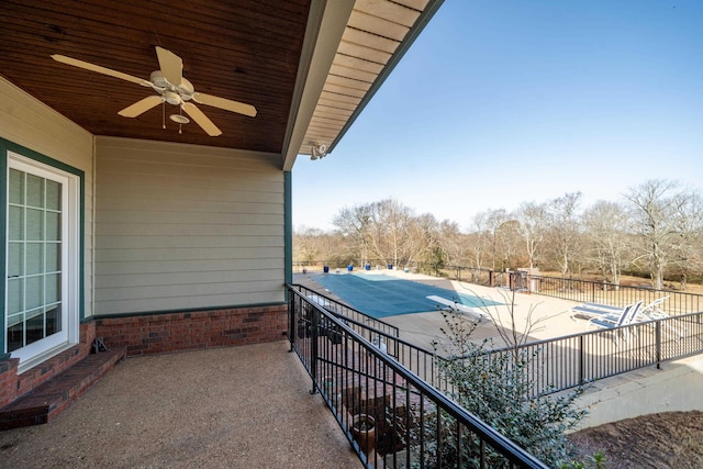 balcony with ceiling fan and a patio area