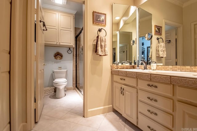 bathroom featuring tile patterned floors, toilet, a shower with shower door, tasteful backsplash, and vanity