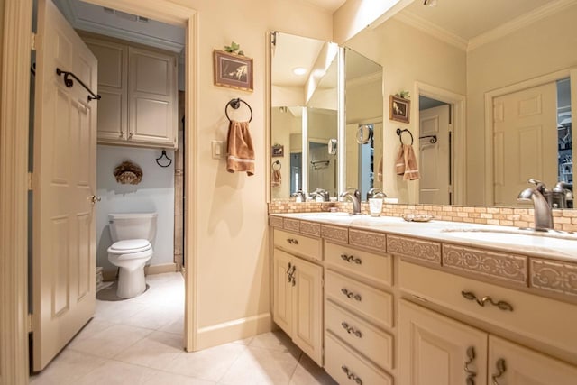 bathroom featuring vanity, ornamental molding, decorative backsplash, tile patterned floors, and toilet