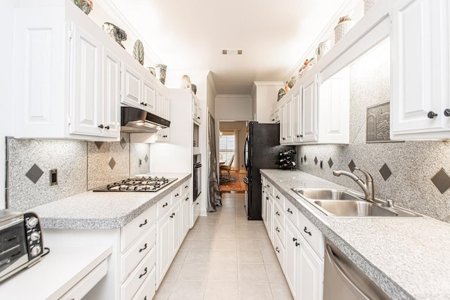 kitchen with crown molding, appliances with stainless steel finishes, sink, and white cabinets