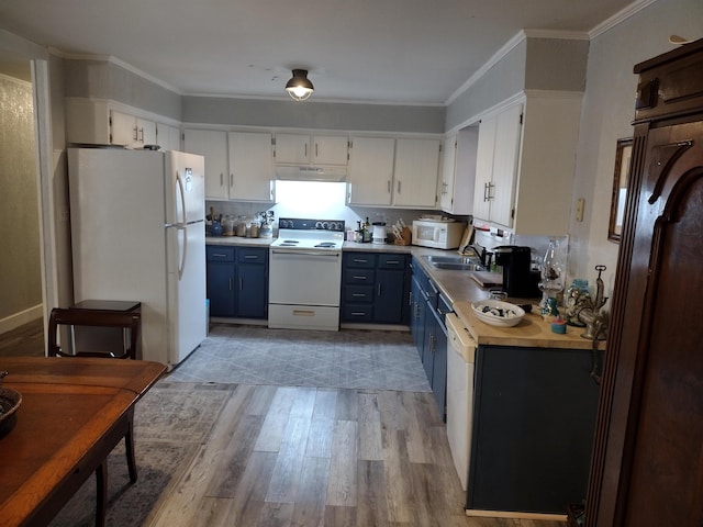 kitchen with white cabinetry, white appliances, and blue cabinets