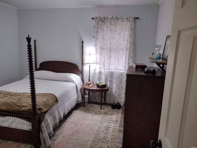 bedroom with ornamental molding