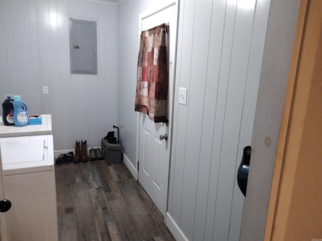 washroom with washer / clothes dryer, dark wood-type flooring, and electric panel