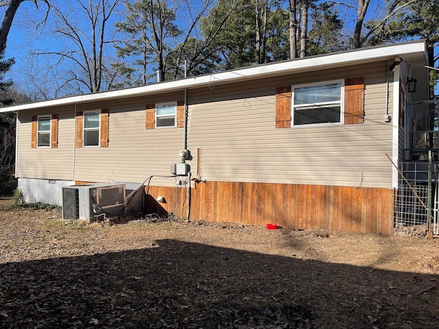 view of property exterior with central air condition unit