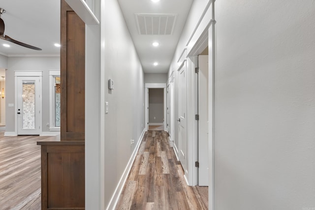 hall featuring wood-type flooring