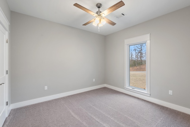 carpeted empty room with ceiling fan