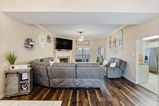 living room featuring ornamental molding and dark hardwood / wood-style flooring