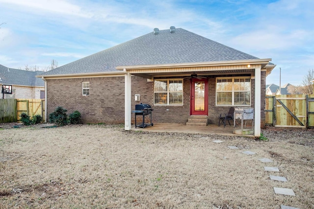 rear view of house featuring a patio