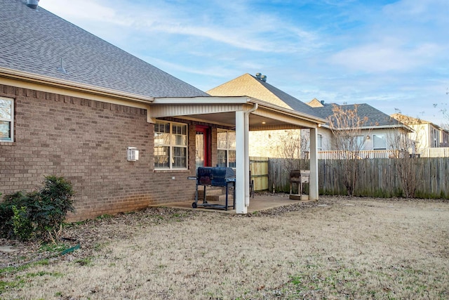 rear view of house featuring a patio