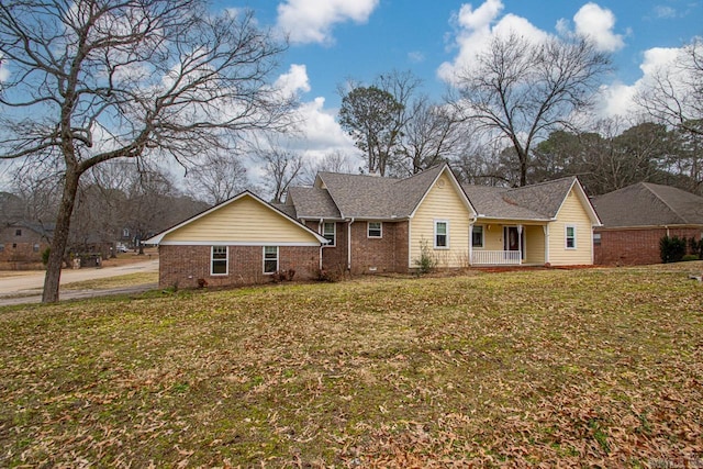 ranch-style house featuring a front yard