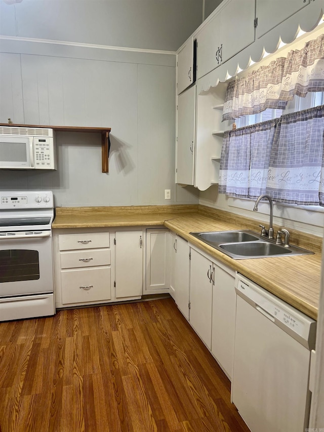 kitchen featuring sink, white appliances, dark wood-type flooring, and white cabinets
