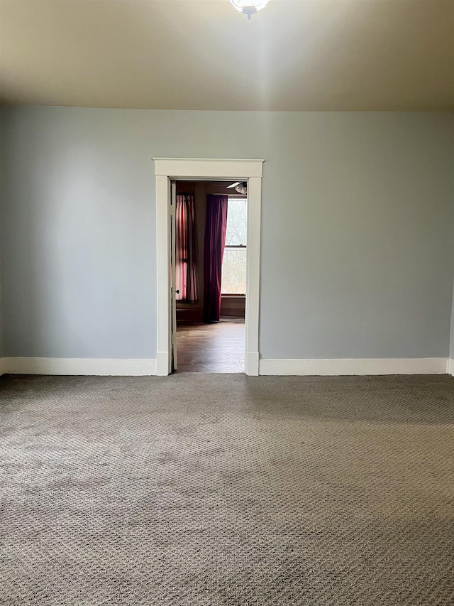 spare room featuring carpet flooring