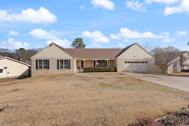 ranch-style house with a garage and a front yard