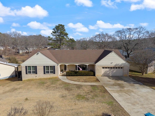 ranch-style home featuring a garage, a front yard, and a porch