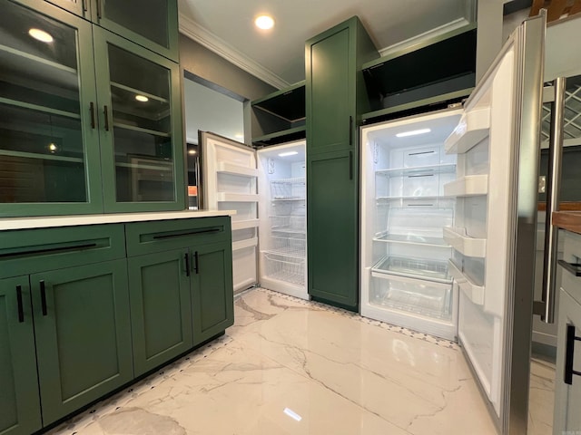 kitchen with crown molding and green cabinetry