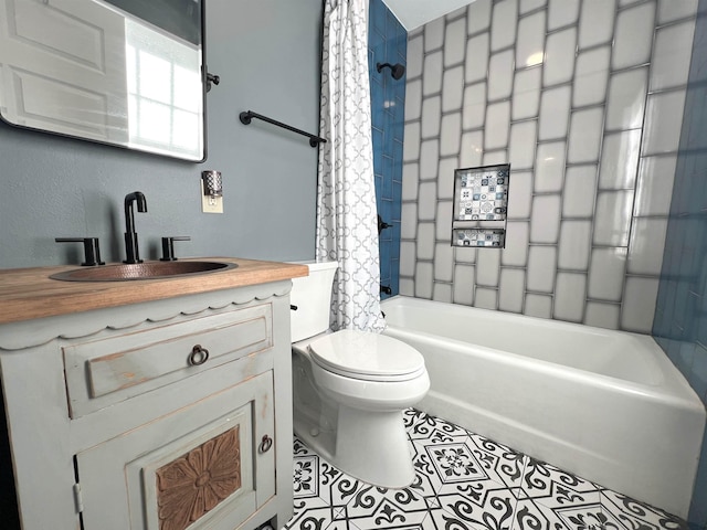 full bathroom featuring vanity, tile patterned floors, toilet, and shower / tub combo with curtain