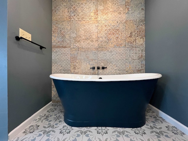 bathroom featuring a bathing tub and tile patterned floors