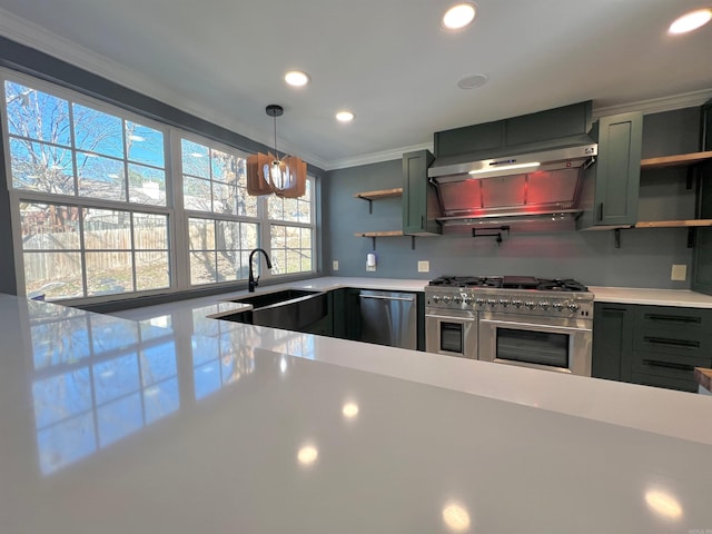 kitchen featuring sink, ventilation hood, hanging light fixtures, ornamental molding, and stainless steel appliances