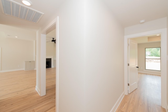 corridor featuring light hardwood / wood-style flooring