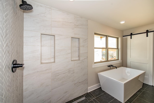 bathroom with separate shower and tub and tile patterned floors