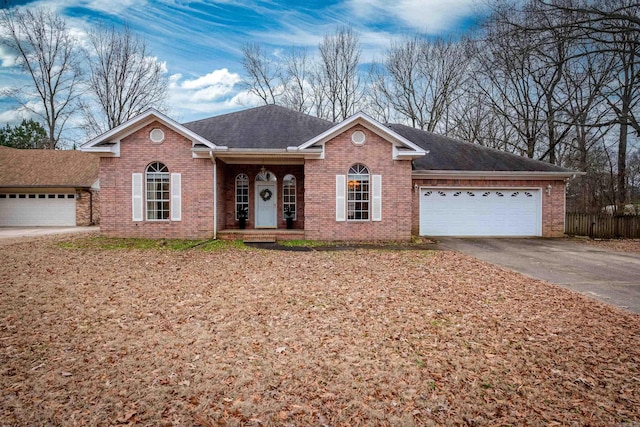 single story home featuring a garage