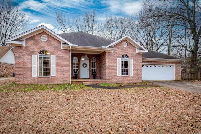 single story home with a garage