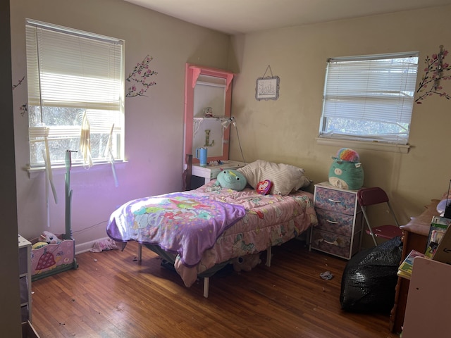 bedroom featuring dark wood-type flooring