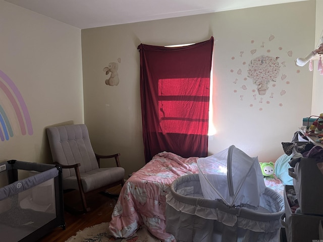 bedroom featuring hardwood / wood-style floors