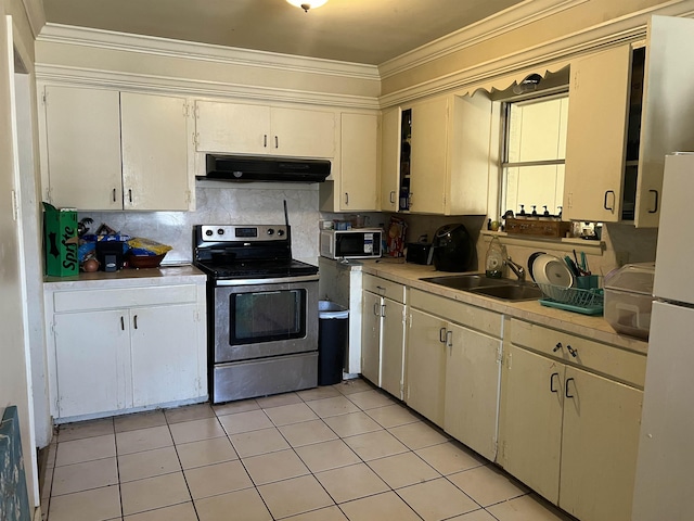 kitchen with crown molding, sink, electric range, and backsplash