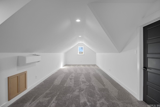 bonus room featuring vaulted ceiling and carpet flooring