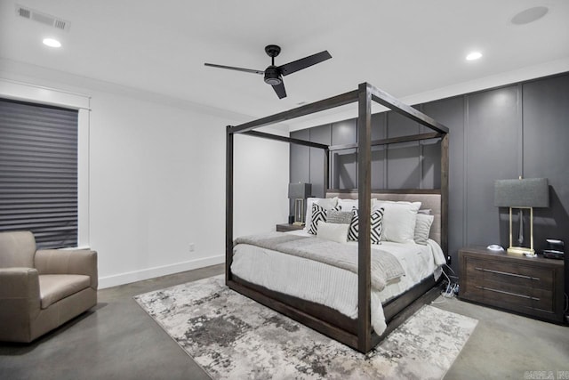 bedroom featuring ceiling fan and concrete floors