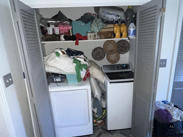 laundry room with washer and dryer