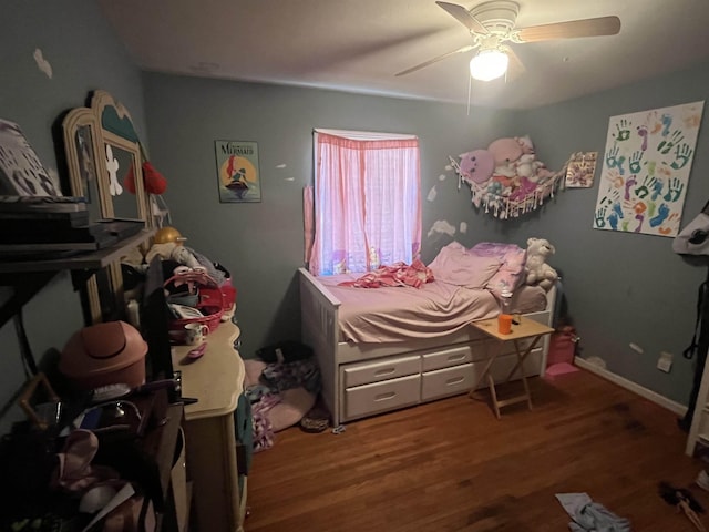 bedroom featuring wood-type flooring and ceiling fan