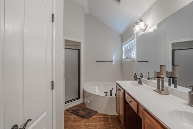 bathroom featuring lofted ceiling, a chandelier, vanity, independent shower and bath, and tile patterned flooring